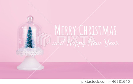 Creative Christmas design on pink pastel color background with Christmas tree. Creative Christmas design on pink pastel color background with Christmas tree. 46281640