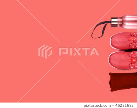 Creative flat lay of sport and fitness equipments on Living Coral background. Creative flat lay of sport and fitness equipments on Living Coral background. 46281652