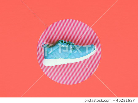 Lilac sneakers on Living Coral background. 46281657