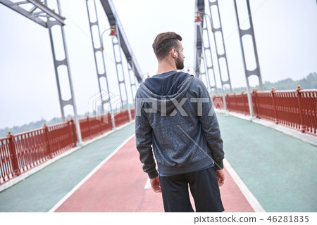 Urban man prepare to jogging in the city on morning. Staying fit concept urban. Urban man prepare to jogging in the city on morning. Staying fit concept urban. 46281835