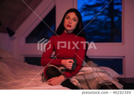 Beautiful woman hold cup and drink coffee 46282389