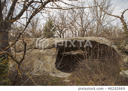 secret cave in the autumn forest 46282669