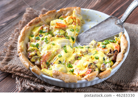 Seafood pie with saffron cream sauce Seafood pie with saffron cream sauce 46283330