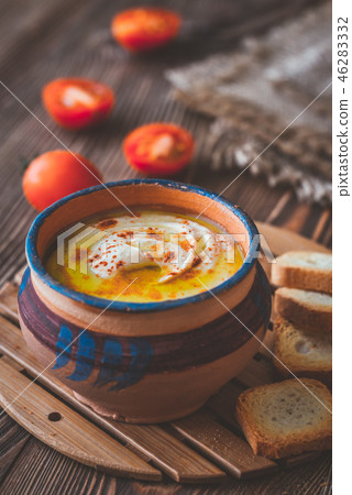 Bowl of hummus with toasts 46283332