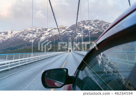 Driving on the Norway, road trip journey, travelling by car. Moving on the bridge. Driving on the Norway, road trip journey, travelling by car. Moving on the bridge. 46284594