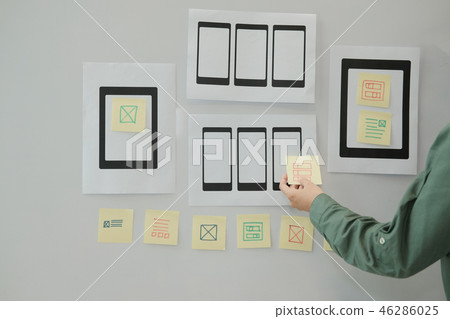 user experience UX designer designing web on mobile phone tablet layout. UI planning mobile application. developer work with business prototype user experience UX designer designing web on mobile phone tablet layout. UI planning mobile application. developer work with business prototype 46286025