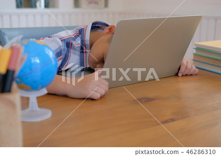 Lazy Stressed Young Little Asian Kid Boy Stock Photo