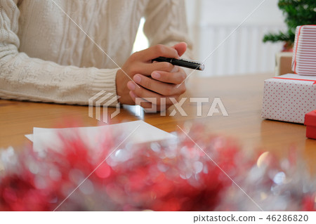 man thinking with pensive expression. christmas decoration at xmas new year holiday celebration. man thinking with pensive expression. christmas decoration at xmas new year holiday celebration. 46286820