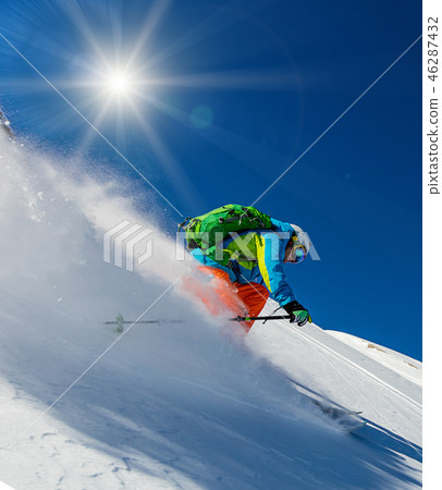 Freeride in fresh powder snow. Freeride in fresh powder snow. 46287432