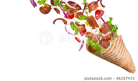 Kebab sandwich with flying ingredients. Kebab sandwich with flying ingredients. 46287433