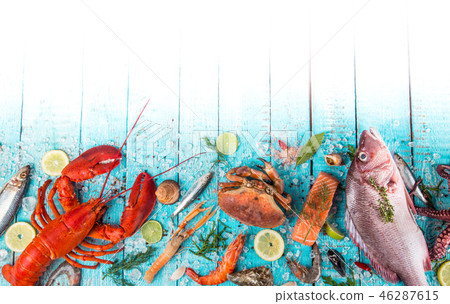 Fresh tasty seafood served on old wooden table. 46287615