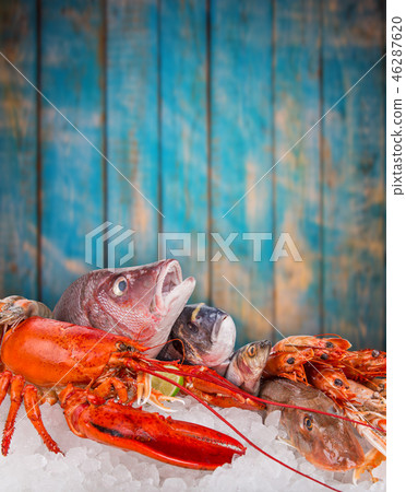 Fresh tasty seafood served on crushed ice. 46287620
