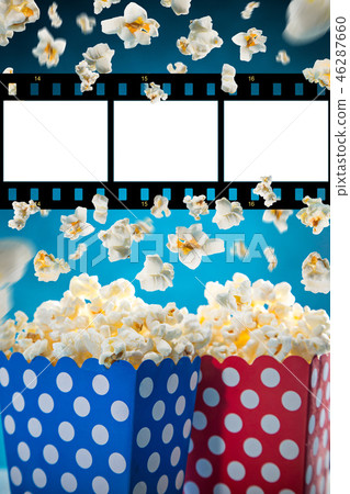 Boxes of popcorn on blue background. Boxes of popcorn on blue background. 46287660