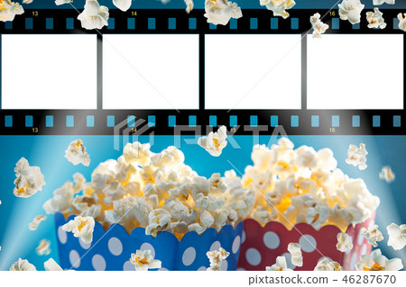 Boxes of popcorn on blue background. Boxes of popcorn on blue background. 46287670