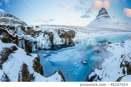 Kirkjufell waterfall with mountain in winter, Iceland Kirkjufell waterfall with mountain in winter, Iceland 46287824