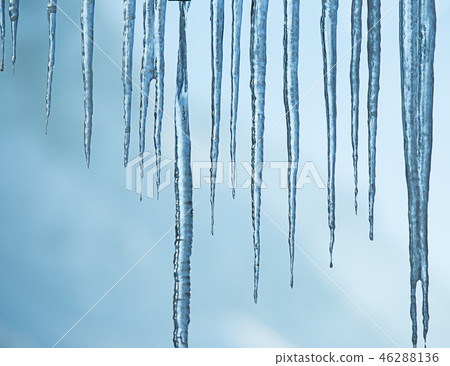 Background of bright transparent icicles. Background of bright transparent icicles. 46288136