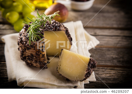 Delicious cheese on the table Delicious cheese on the table 46289207