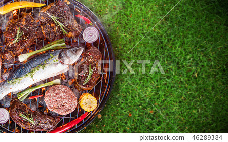 Barbecue grill with sea fishe, close-up. Barbecue grill with sea fishe, close-up. 46289384