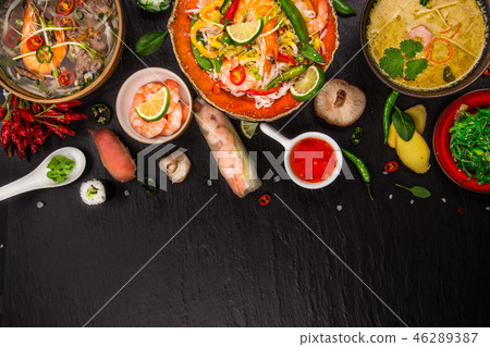 Various of asian meals on rustic background , top view , place for text. Various of asian meals on rustic background , top view , place for text. 46289387