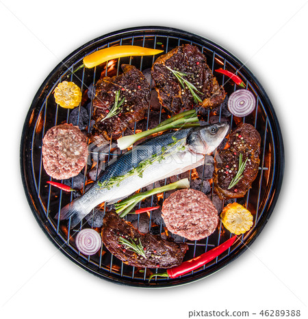 Barbecue grill with beef steaks, close-up. Barbecue grill with beef steaks, close-up. 46289388