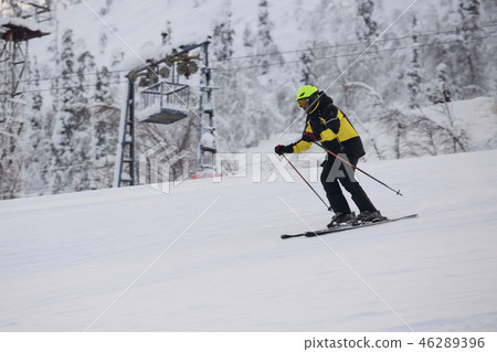 Alpine skier at arctic slope 46289396