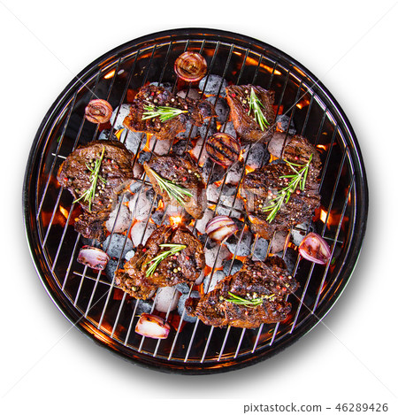 Barbecue grill with beef steaks, close-up. 46289426