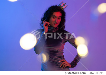Young woman in pink blue neon lights. Creative colorful portrait Young woman in pink blue neon lights. Creative colorful portrait 46290195