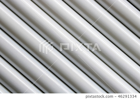 Texture of white steel pipe sort in diagonal Texture of white steel pipe sort in diagonal 46291334