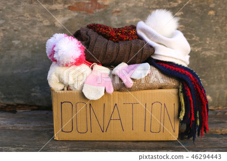 Donation box with warm winter clothes Donation box with warm winter clothes 46294443