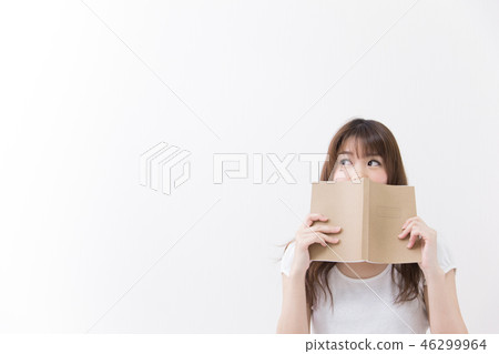 A woman reading A woman reading 46299964