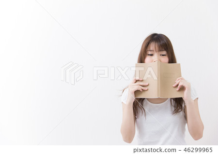 A woman reading A woman reading 46299965