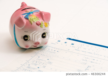 Lifestyle image Birth certificate and piggy bank Lifestyle image Birth certificate and piggy bank 46300244