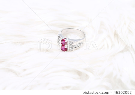 Pink gem stone on diamond ring 46302092