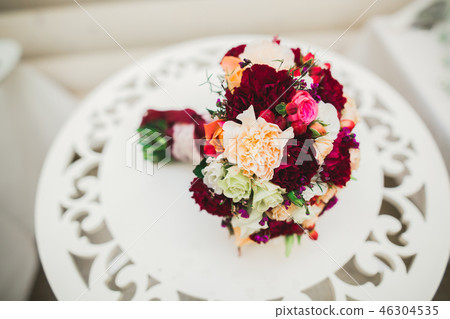 Beautiful wedding bouquet with different flowers, roses Beautiful wedding bouquet with different flowers, roses 46304535