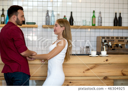 Beauty couple having fun at cafe with cocktails 46304925