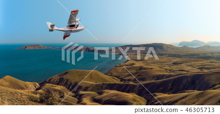 hydroplane flying over beauty sea bay hydroplane flying over beauty sea bay 46305713