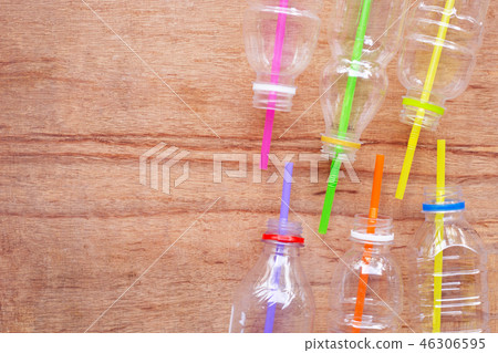 Plastic waste, Plastic bottles with straws Plastic waste, Plastic bottles with straws 46306595