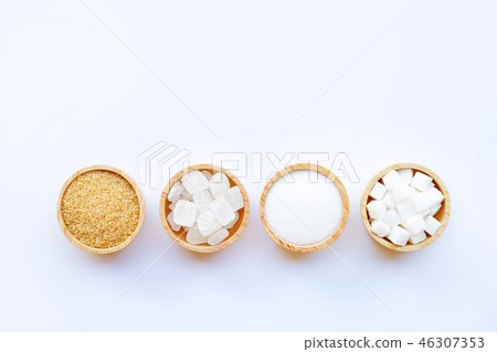 Various types of sugar on white background. Various types of sugar on white background. 46307353