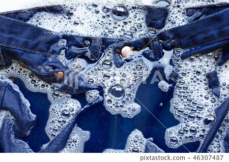 Wet Jeans, Soak and  Washing. 46307487