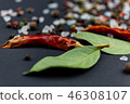 Spices on a black background. 46308107