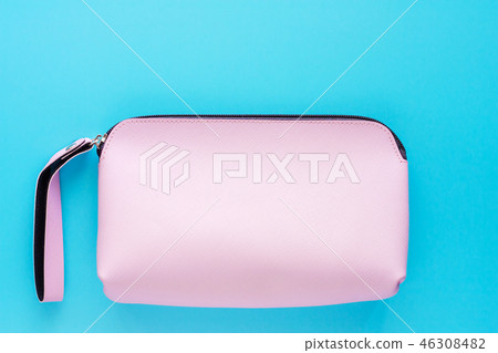Pink lady leather bag on blue background Pink lady leather bag on blue background 46308482