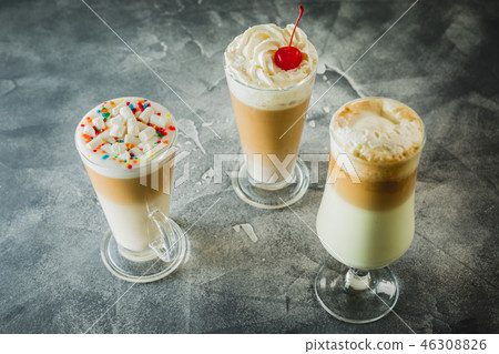 Sweet kids milkshake drinks with whipped cream 46308826