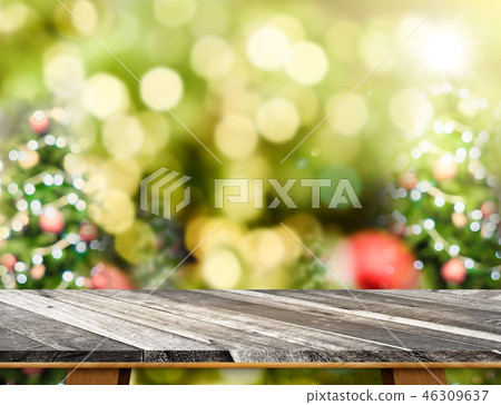 Grunge blank wooden table top with blur christmas Grunge blank wooden table top with blur christmas 46309637
