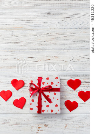 holiday handmade present in paper with red heart holiday handmade present in paper with red heart 46311326