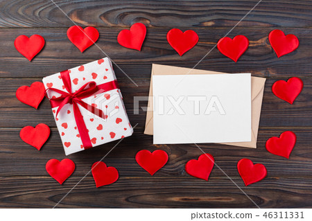 holiday handmade present in paper with red heart holiday handmade present in paper with red heart 46311331