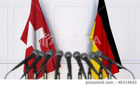 Flags of Switzerland and Germany at international meeting or conference. 3D rendering Flags of Switzerland and Germany at international meeting or conference. 3D rendering 46314693