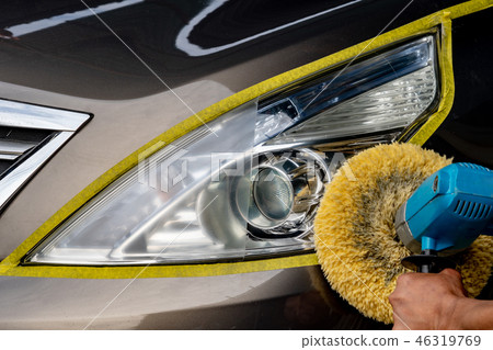 Car headlights with power buffer machine at servic Car headlights with power buffer machine at servic 46319769