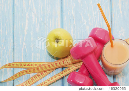 The concept of a healthy diet. Small dumbbells 46320963
