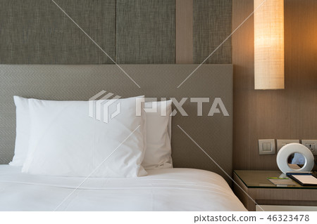 Close up fragment of bedroom with reading lamp Close up fragment of bedroom with reading lamp 46323478