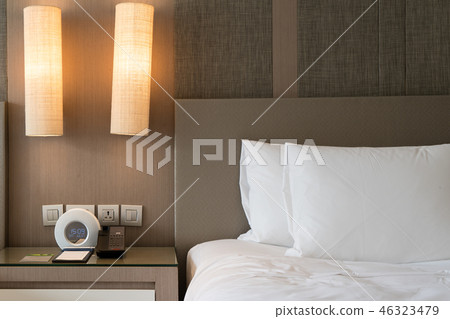 Close up fragment of bedroom with reading lamp  46323479